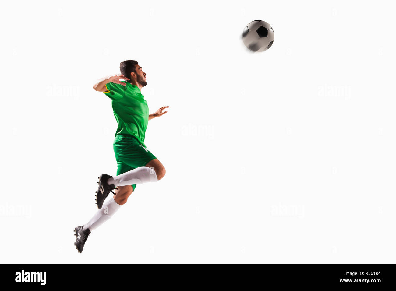 Athlete heading soccer ball Stock Photo Alamy
