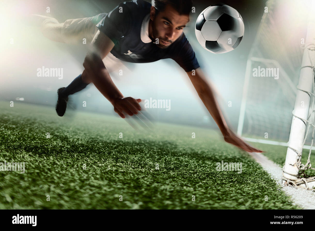 Soccer player heading soccer ball Stock Photo Alamy