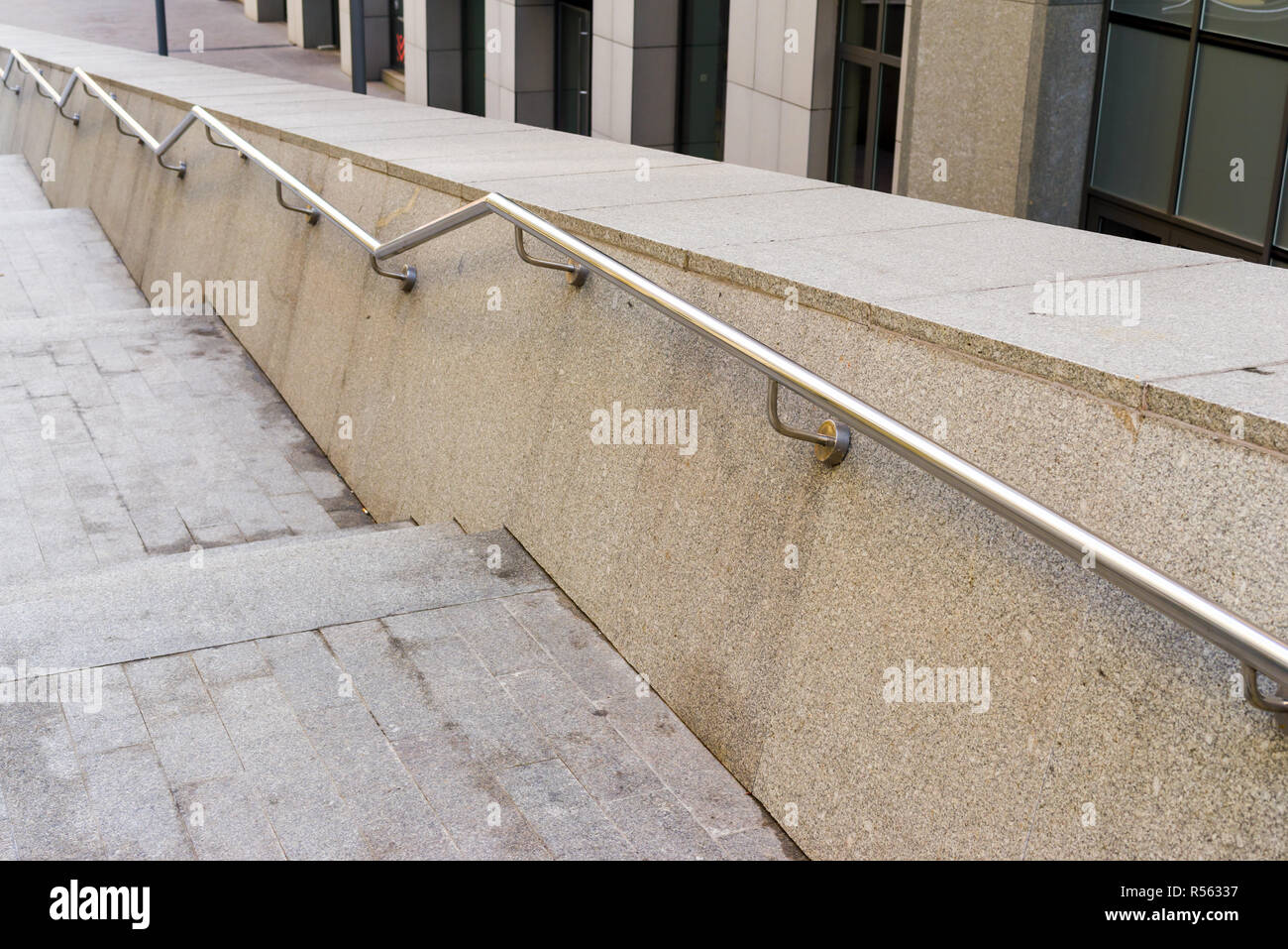 Stainless Steel Metal Handrails On Stone Steps Stock Photo