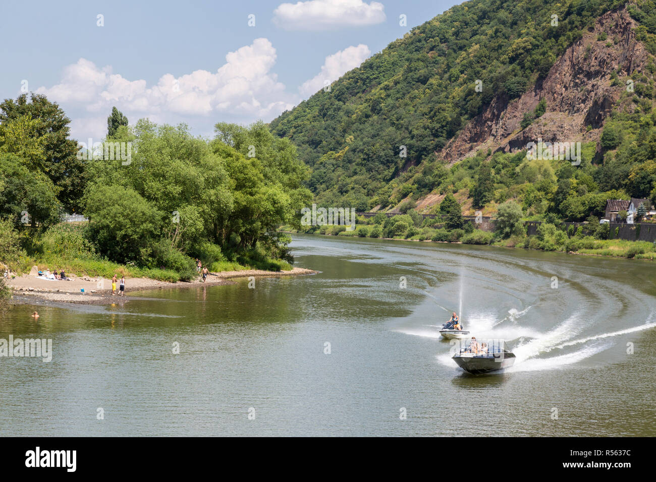 Germany.  Pleasure Boat and Jet Ski on the Moselle near Moselkern. Stock Photo