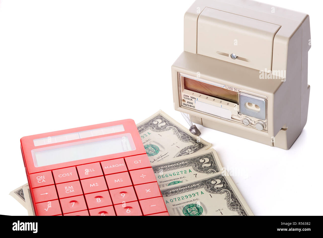 Electric meter, calculator and money Stock Photo Alamy