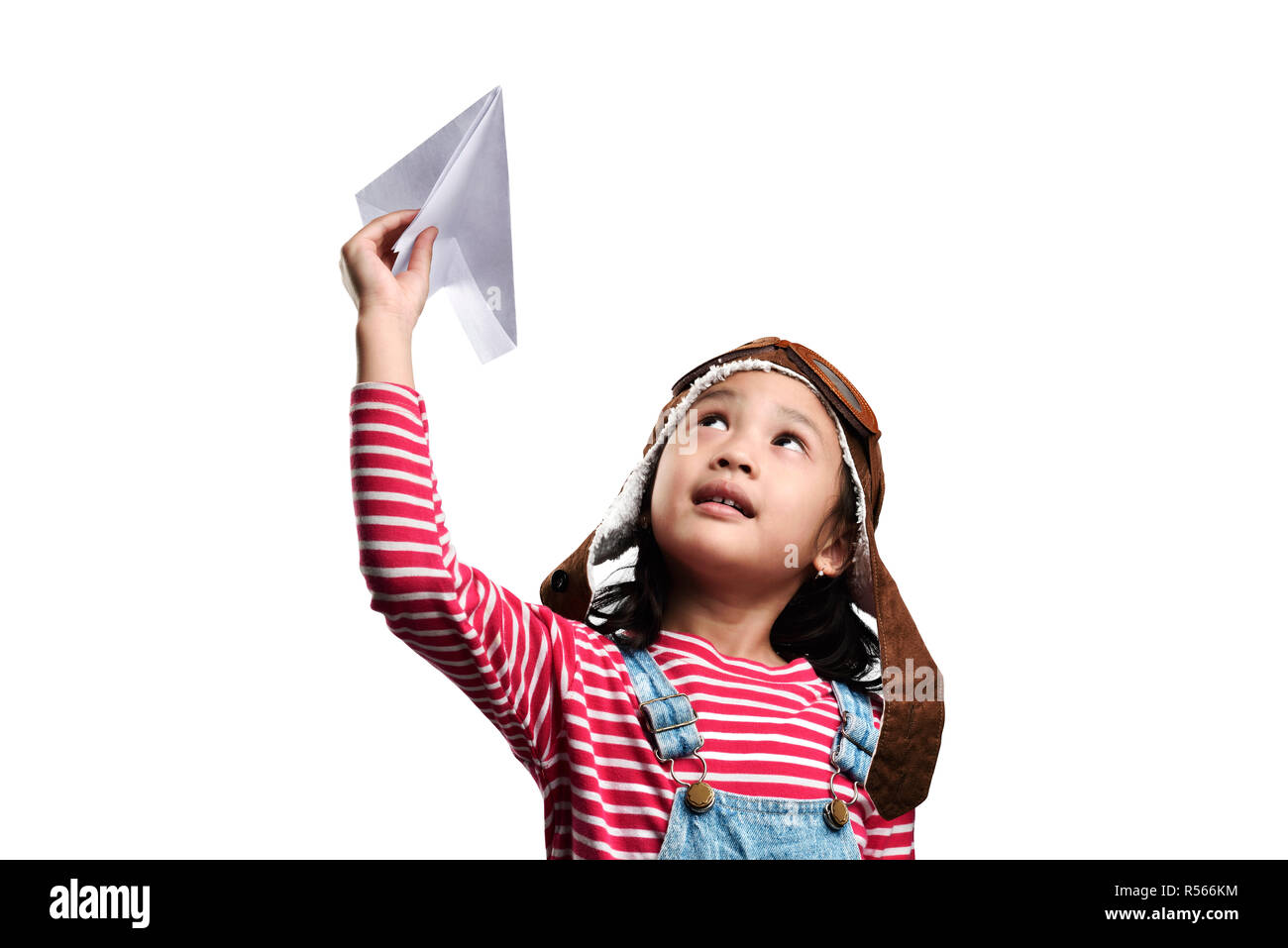 Happy asian little girl playing with toy paper airplane Stock Photo - Alamy