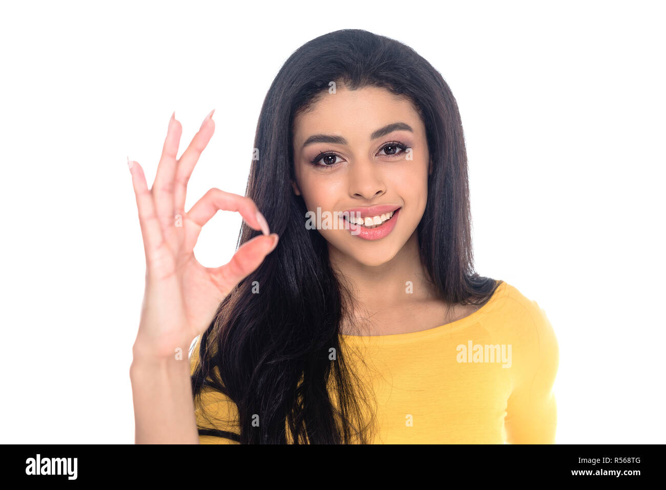 happy african american woman showing ok sign and smiling at camera ...