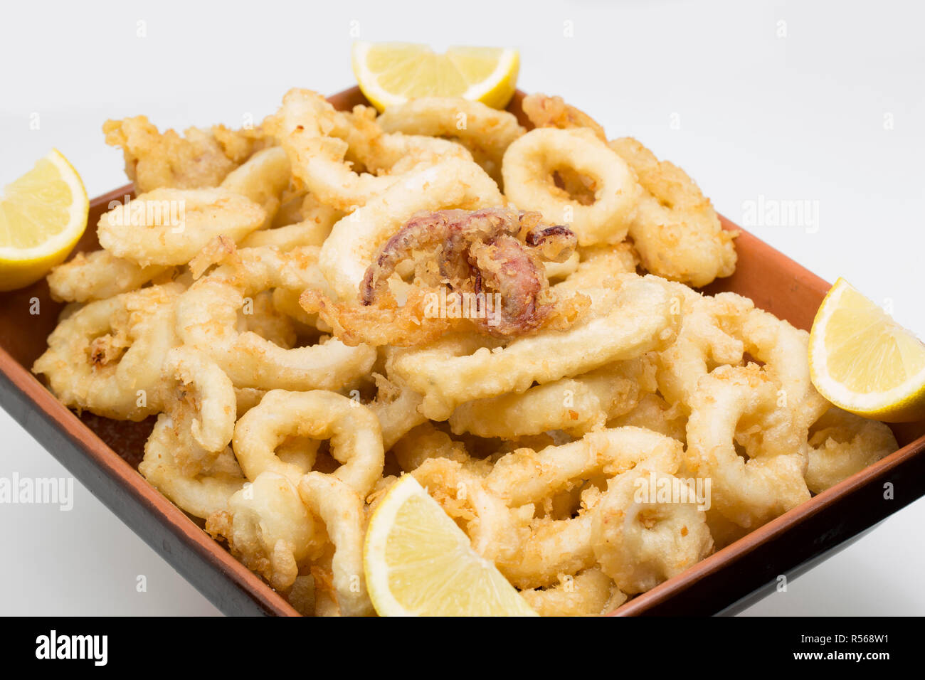A bowl of homecooked deep fried battered squid rings and tentacles from a Loligo vulgaris squid