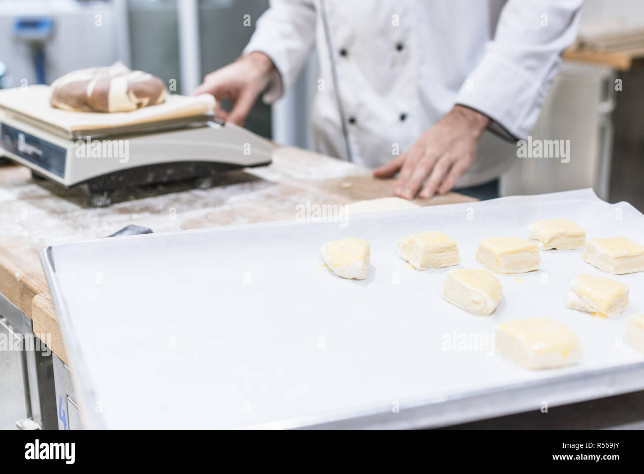 Baker Weighing Dough On Kitchen Scale Stock Photo 1646504854