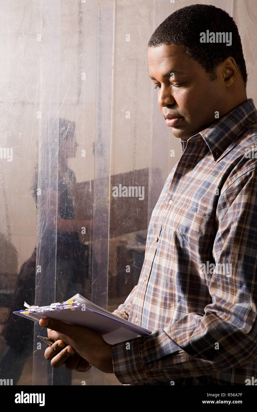 Man working in warehouse Stock Photo