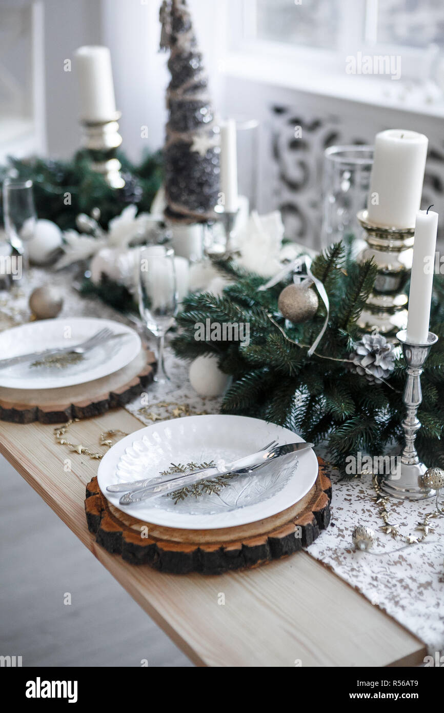 Table served for Christmas dinner in living room, close up view Stock Photo