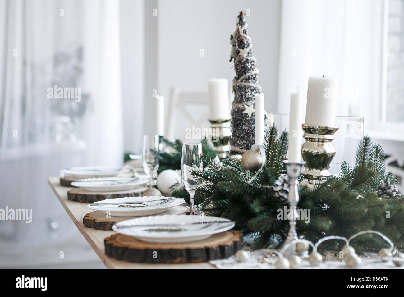 Table served for Christmas dinner in living room, close up view Stock Photo