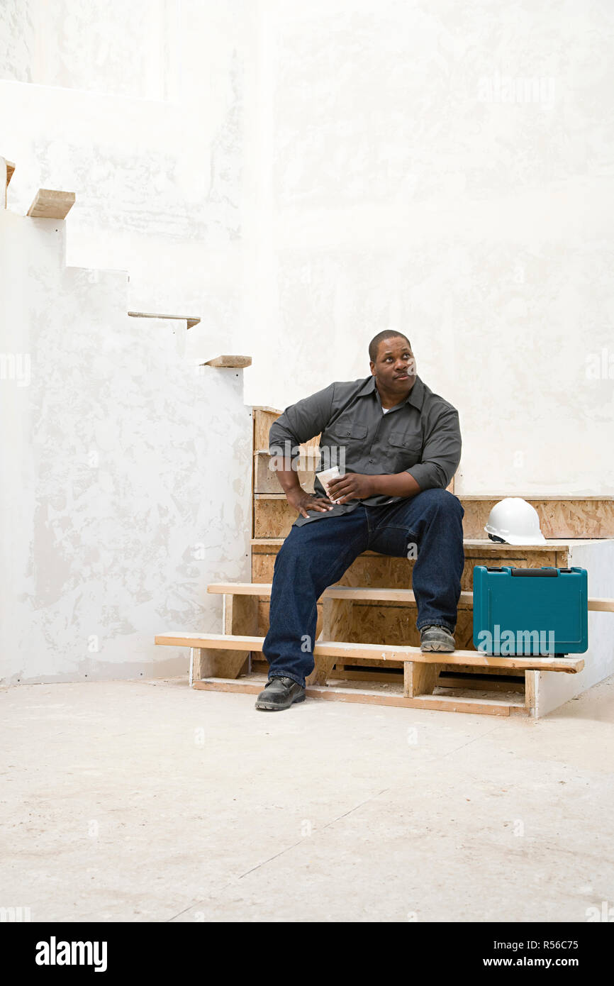 A builder taking a break Stock Photo