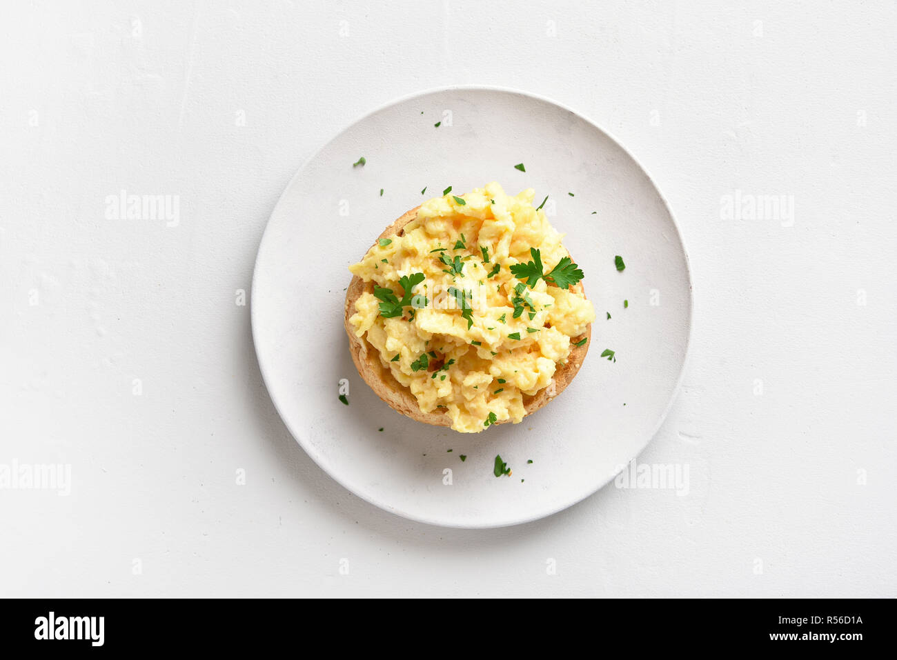 plate of scrambled eggs isolated on white background, top view Stock Photo  - Alamy