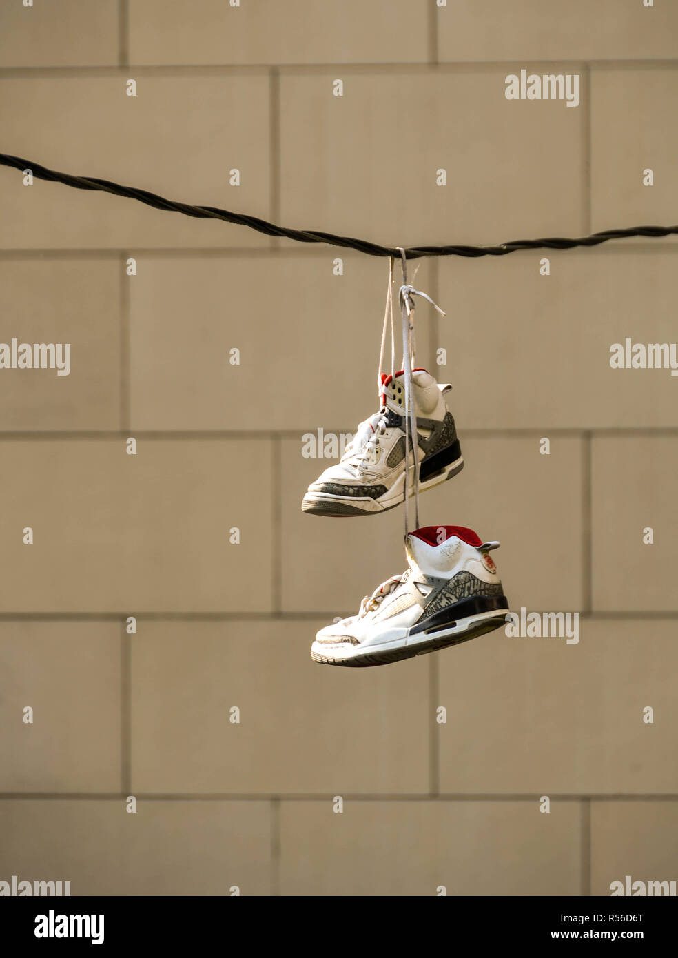 Hanging trainers hi-res stock photography and images - Alamy