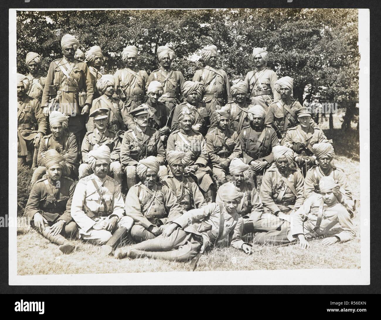 Officers of the Jodhpur Lancers [Linghem, France]. A group portrait, in uniform, seated in the open air, 28th July 1915 . Record of the Indian Army in Europe during the First World War. 20th century, 28th July 1915. Gelatin silver prints. Source: Photo 24/(157). Author: Girdwood, H. D. Stock Photo