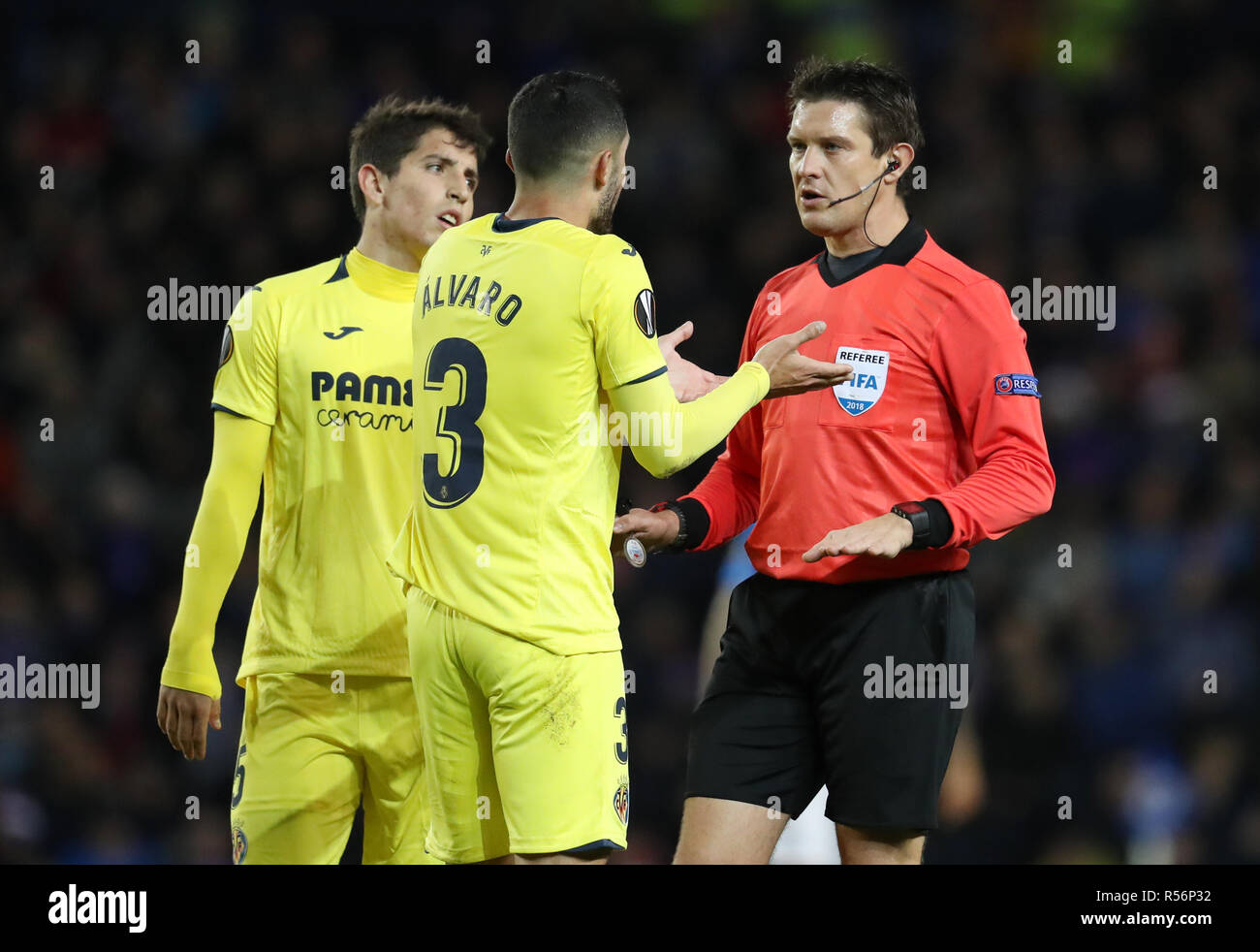 Villarreal's Gonzalez Alvaro speak with referee Matej Jug during the UEFA Europa League, Group G match at Ibrox Stadium, Glasgow. Stock Photo