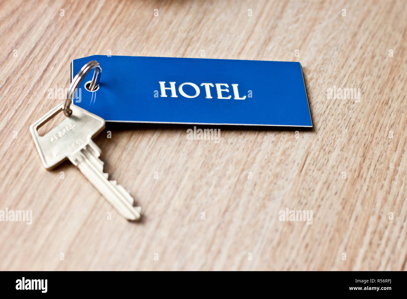 A hotel key with a tag on the table Stock Photo