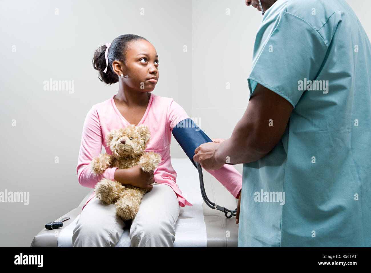 Girl having a check up Stock Photo - Alamy