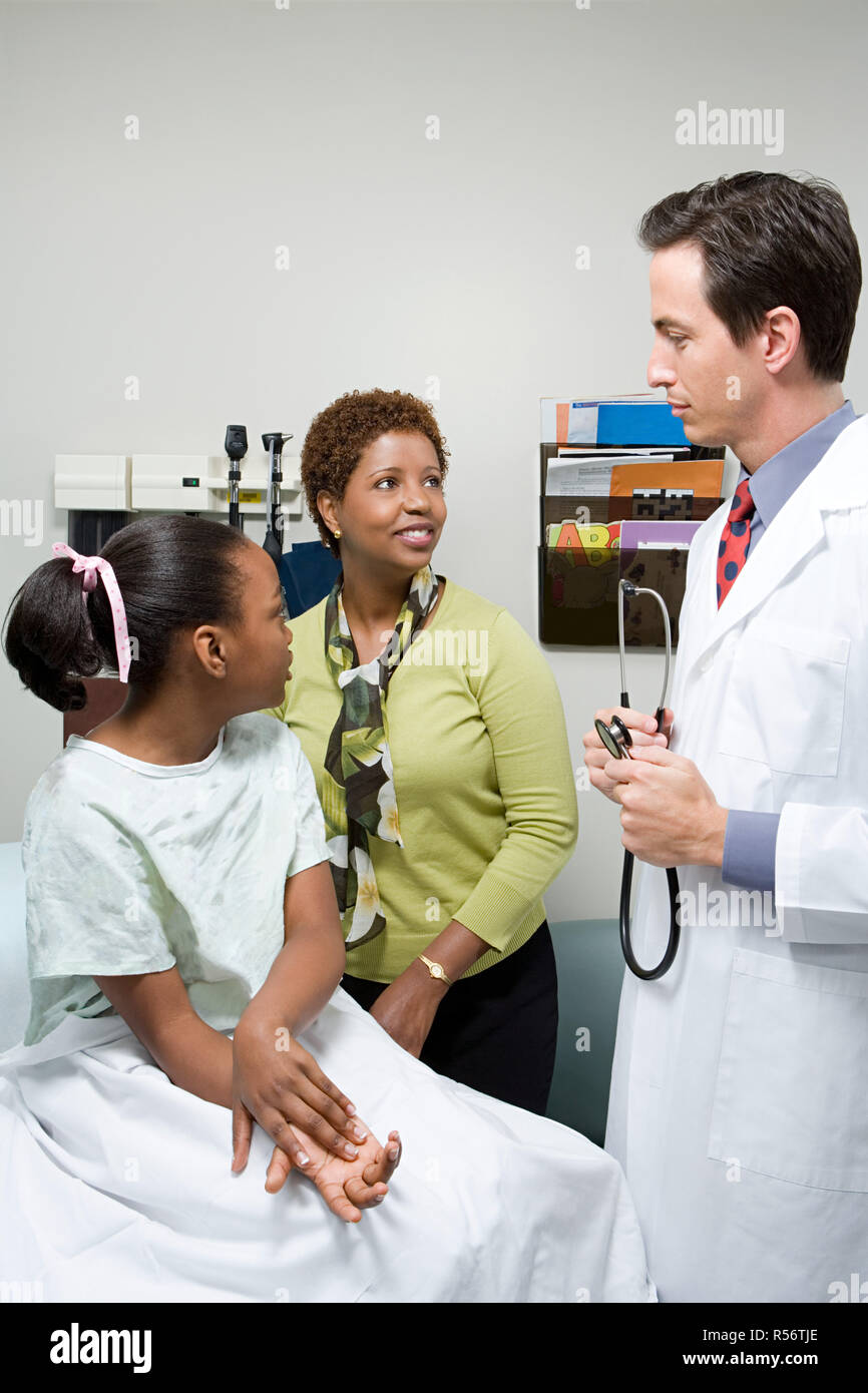 Doctor with mother and daughter Stock Photo Alamy