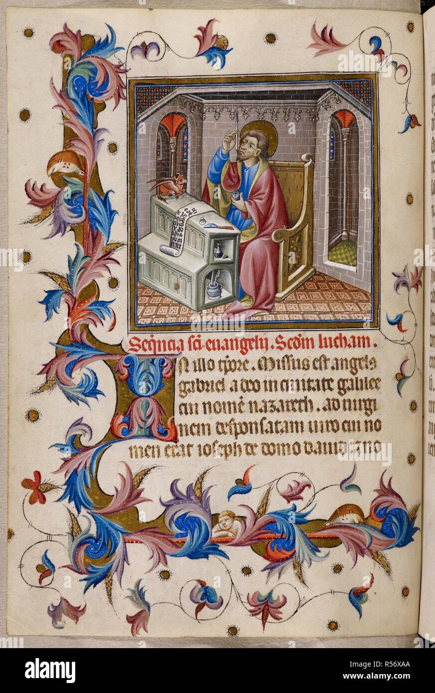St Luke writing his Gospel . Psalter and Hours, Dominican use (the 'Prayerbook of Alphonso V of Aragon). 1436-1443. Source: Add. 28962, f.34v. Language: Latin. Stock Photo