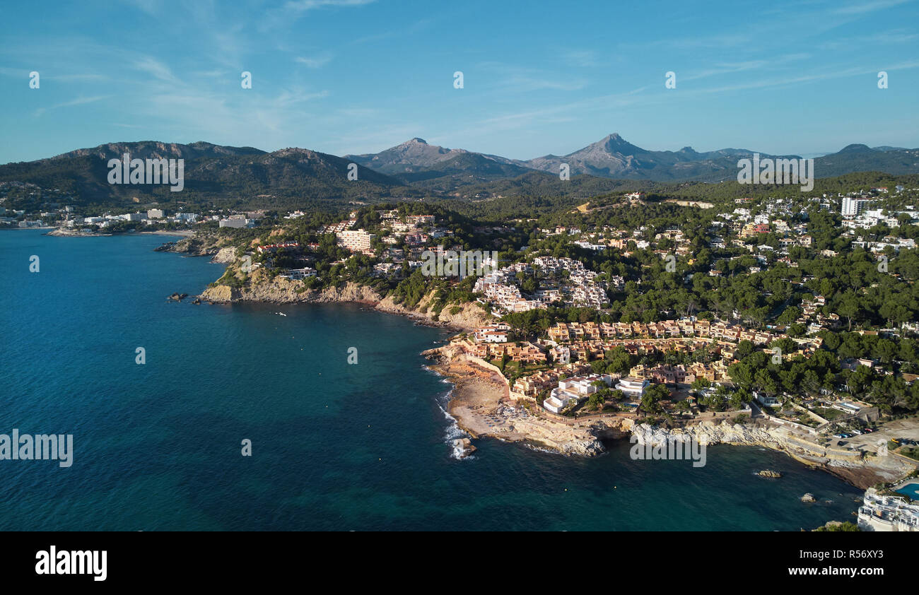Aerial panorama of Costa de la Calma shoreline and turquoise clear green water of Mediterranean Sea. Palma de Mallorca, Spain Stock Photo