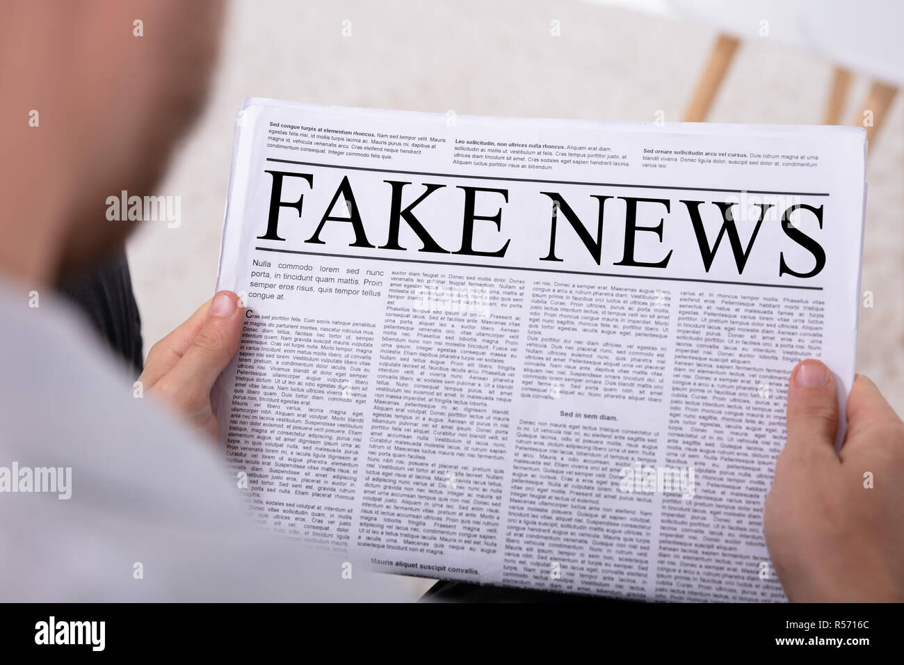 News paper holding up hires stock photography and images Alamy