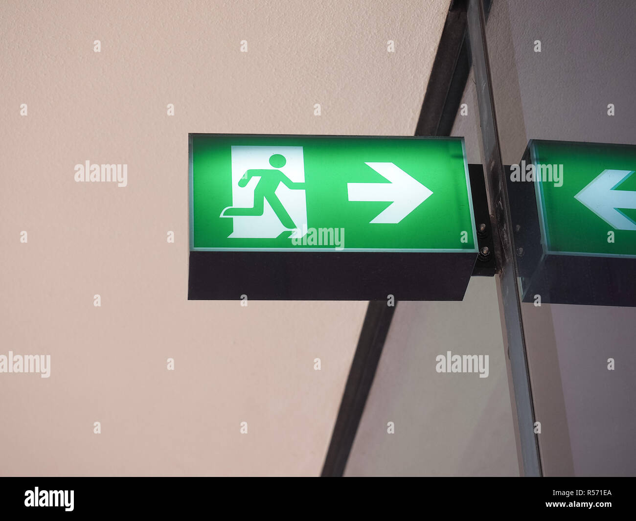 Emergency exit sign Stock Photo - Alamy