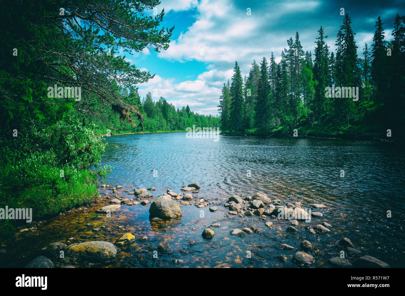 scenic river with rocks colored Stock Photo - Alamy