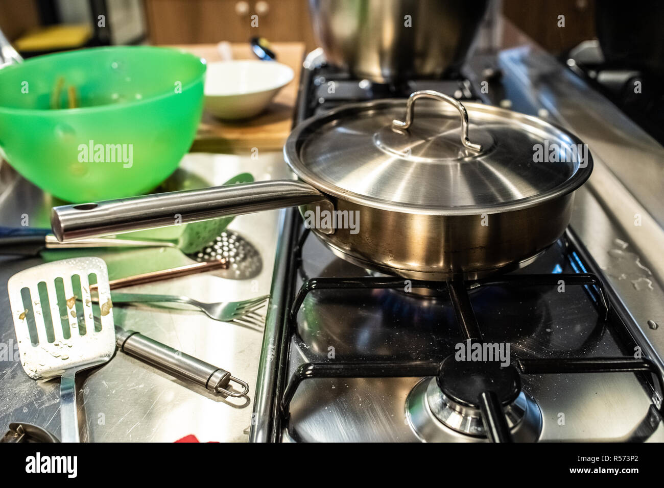 Metal pot in a restaurant kitchen Stock Photo - Alamy