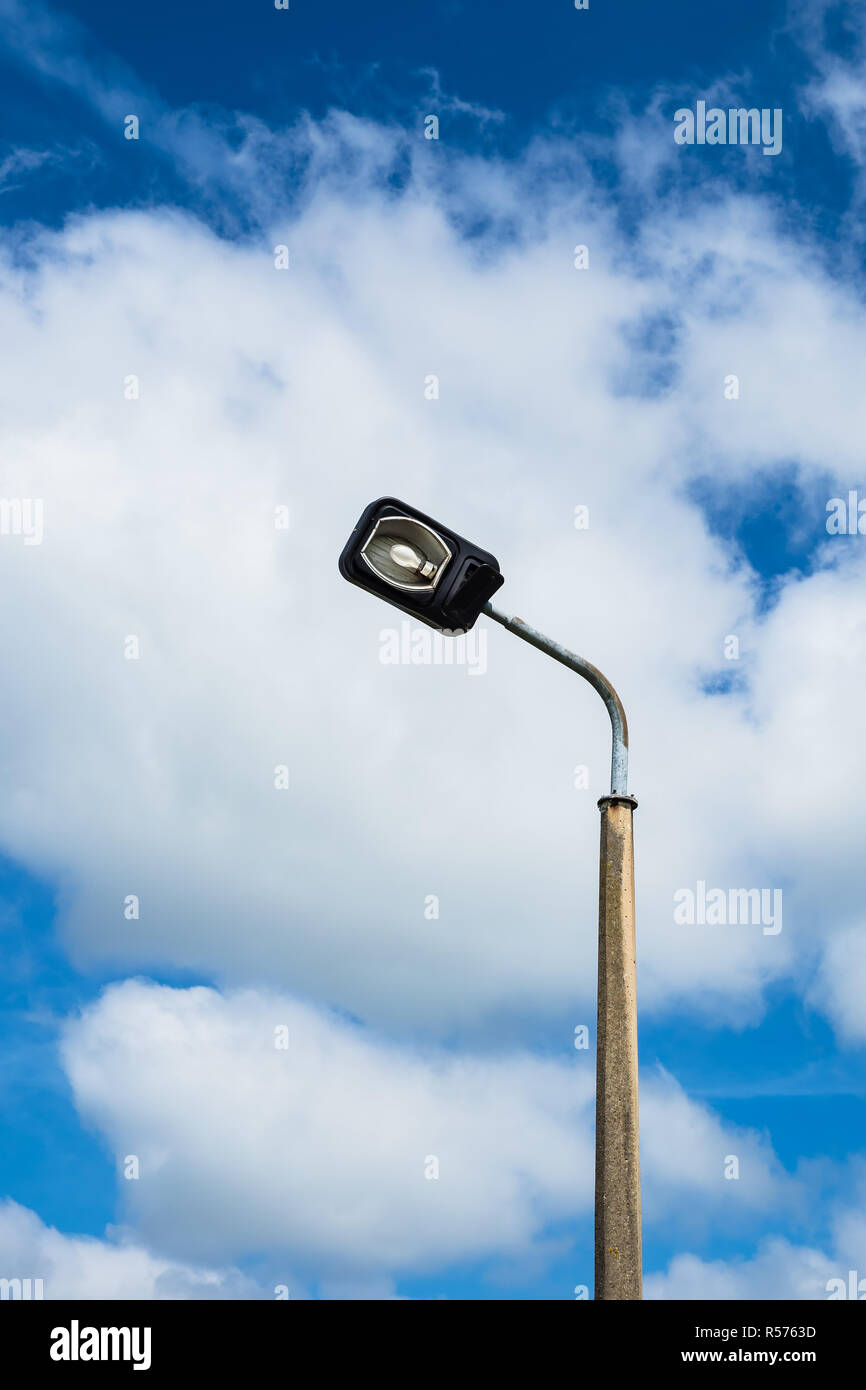 street lamp with sky and blue clouds Stock Photo
