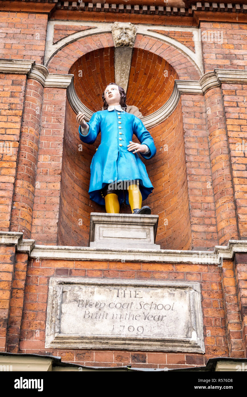 London England,UK,Westminster,Caxton Street,Blewcoat School,historic bluecoat charity school,built 1709,statue,plaque marker,UK GB English Europe,UK18 Stock Photo