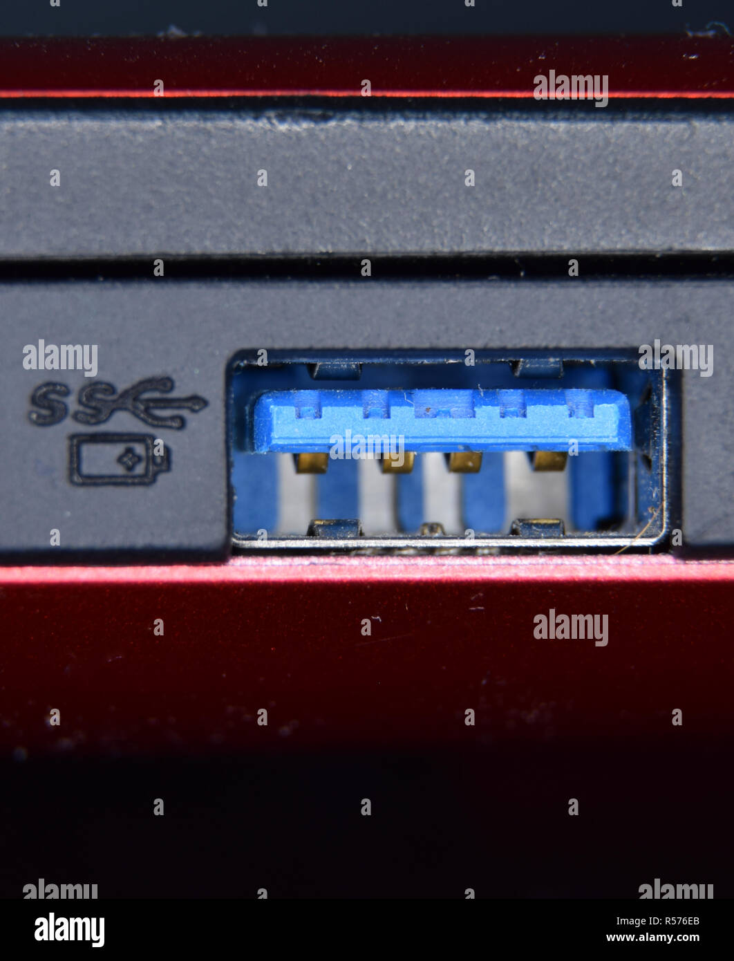 A USB 3.0 connector port on a laptop computer Stock Photo