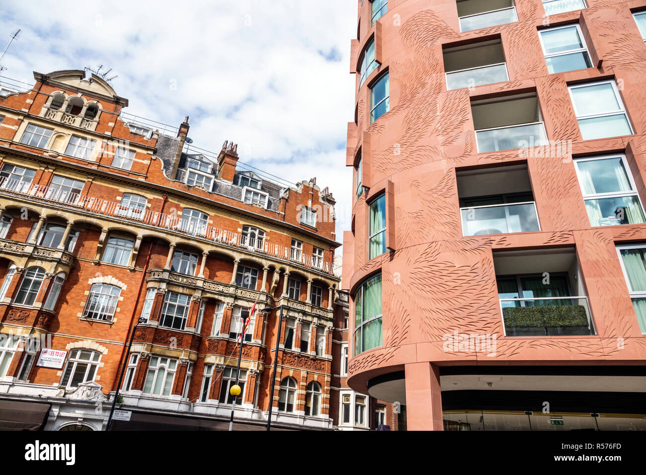 London England,UK,Westminster,Wellington House,mixed use building,exterior facade,contemporary architecture,carved cladding walls by Georgia Russell,B Stock Photo