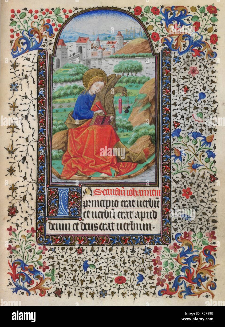 St John writing his gospel. Book of Hours. France; 15th century. [Whole folio] Gospel readings. St John seated writing his gospel, in a landscape with river and walled town in the distance. Beside him the eagle holds a cord in its beak, to which is attached a pen box and an inkpot. Beginning of St John's gospel, with decorated initial 'I'. Borders of foliate decoration  Image taken from Book of Hours.  Originally published/produced in France; 15th century. . Source: Harley 2971, f.13. Language: Latin. Stock Photo