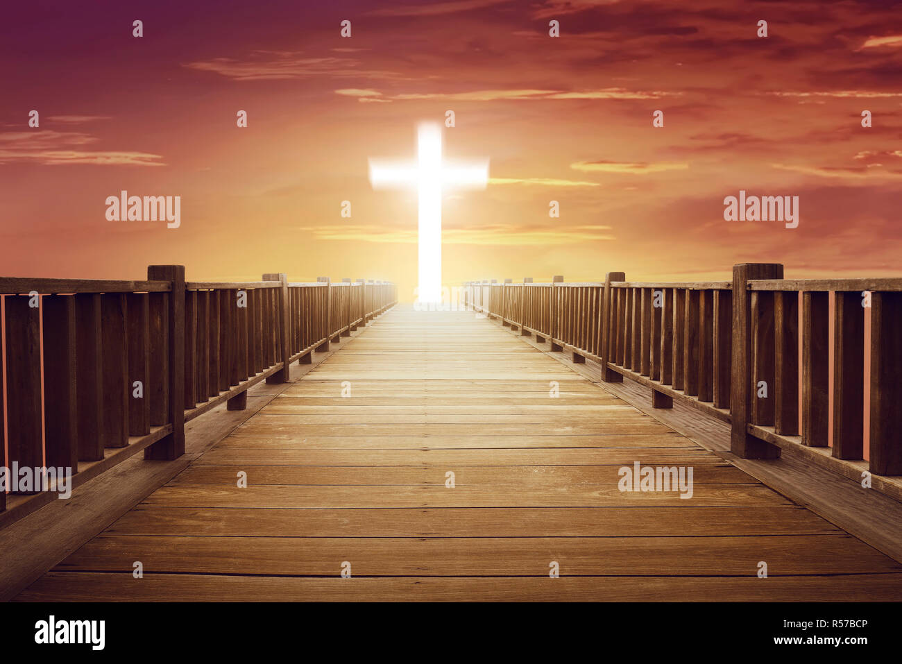 Shine cross shape in the end of wooden path Stock Photo