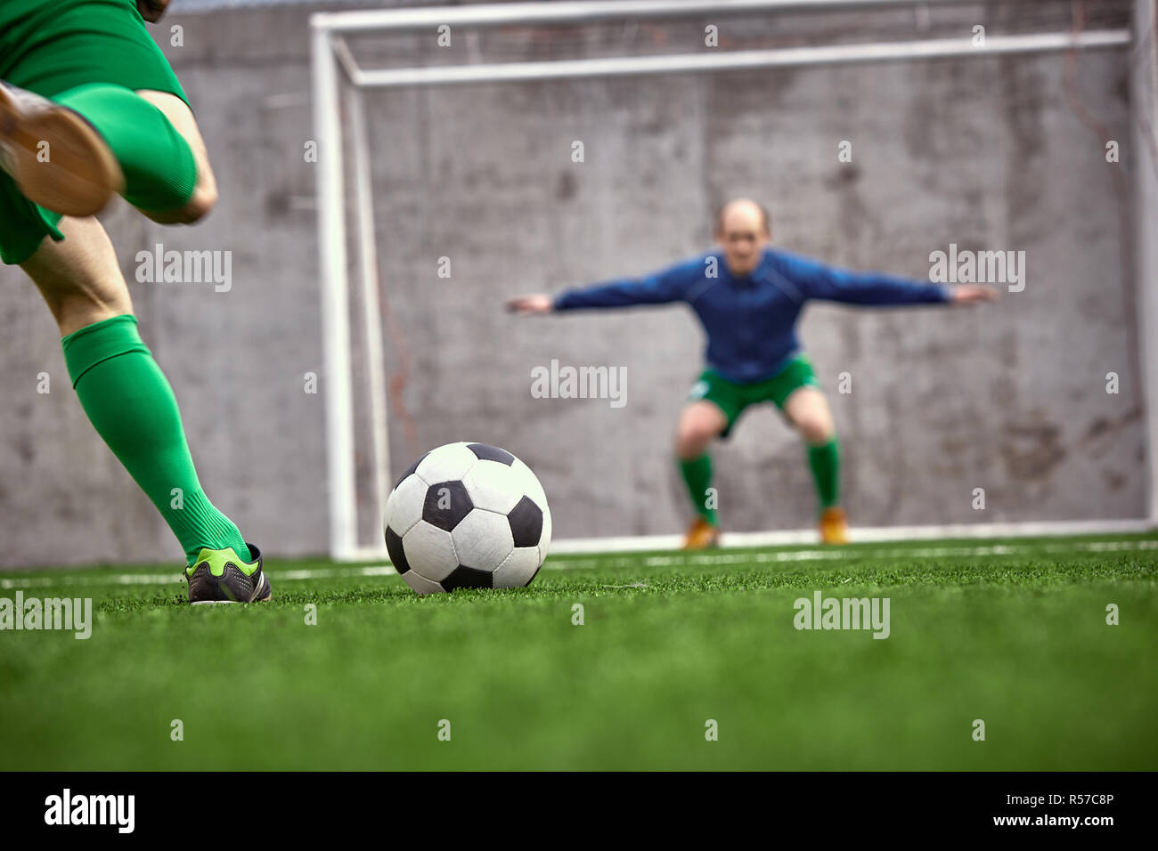 The legs of soccer football player Stock Photo Alamy
