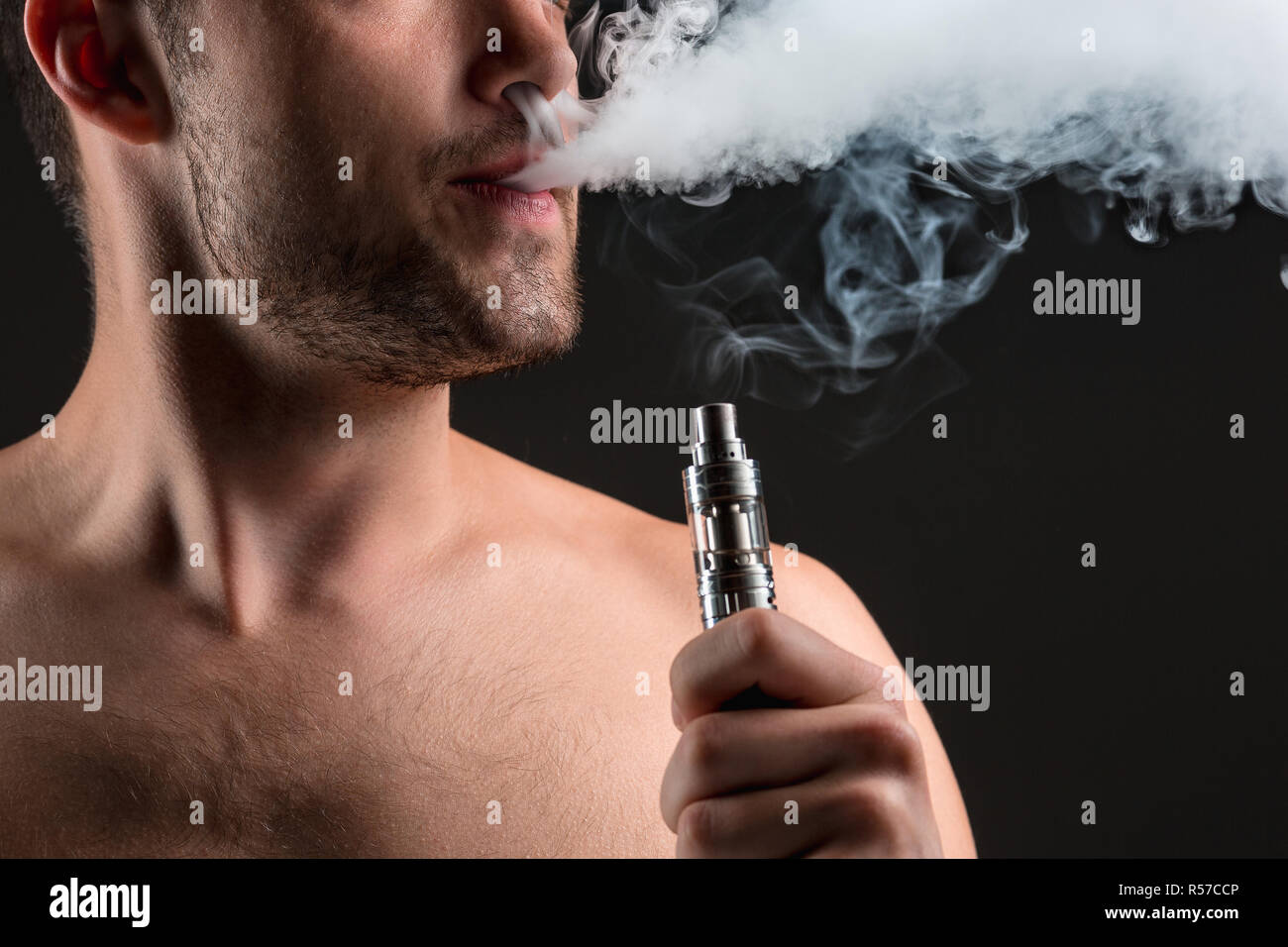 The face of vaping young man Stock Photo Alamy