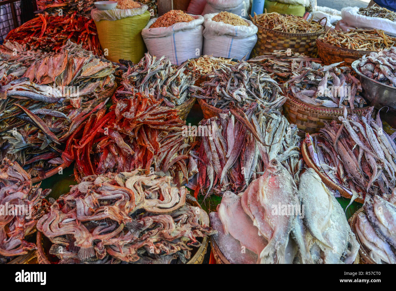 Traditional Asian fish market, stall full of dried seafood in Taunggyi