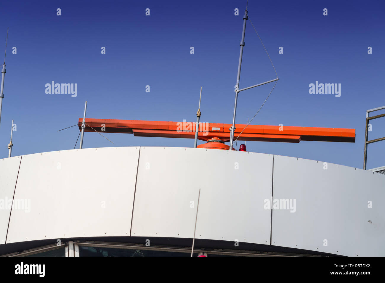 radar at the airport and blue sky Stock Photo - Alamy