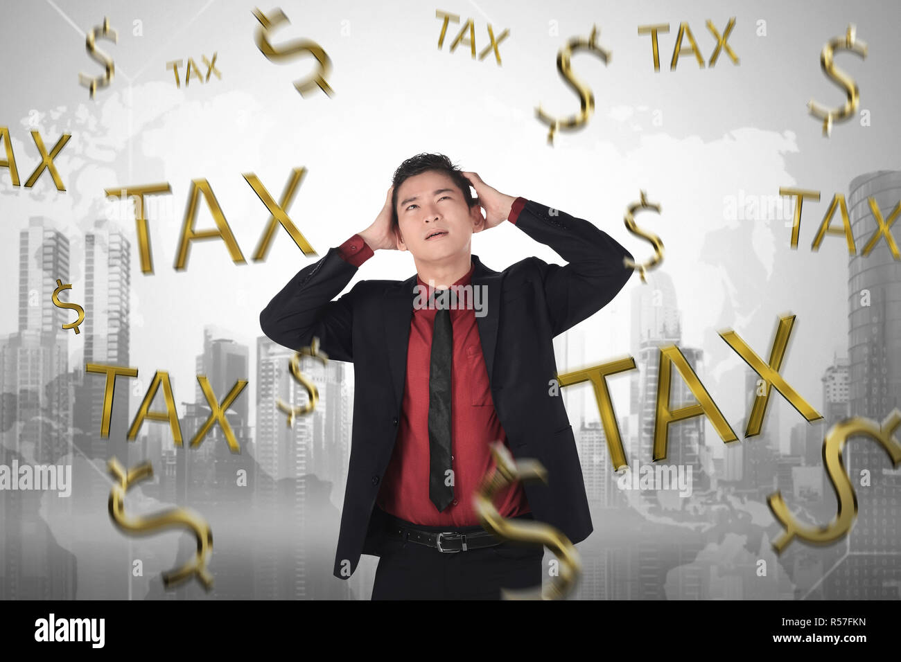 Frustration asian businessman with tax time sign Stock Photo