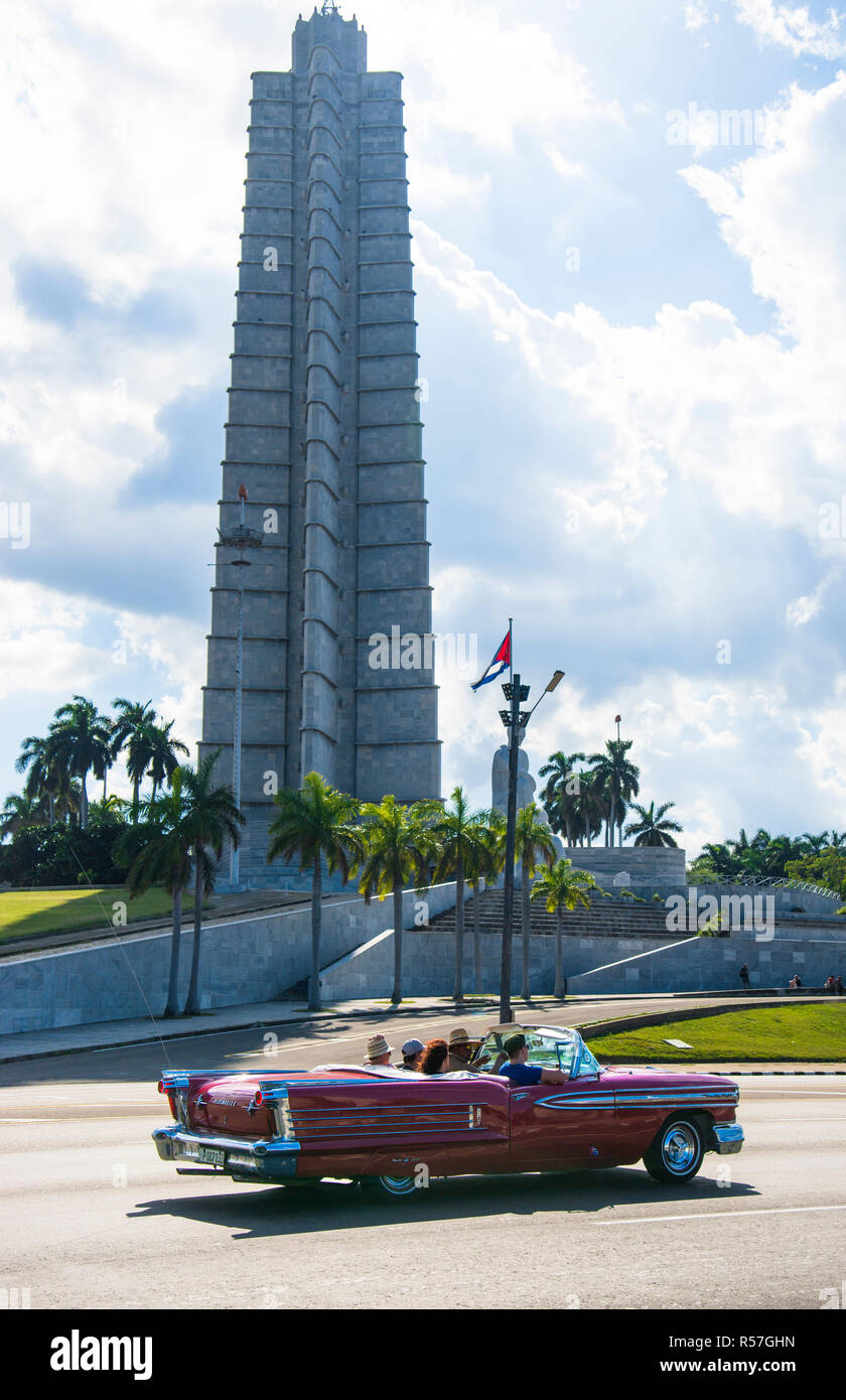 1958 Oldsmobile Futuramic red convertible by the José Martí Memorial located on the northern side of the Plaza de la Revolución. Stock Photo
