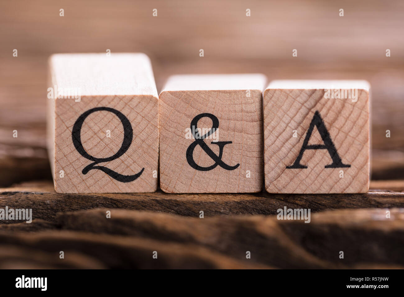 Q&A Text On Wooden Block Stock Photo - Alamy