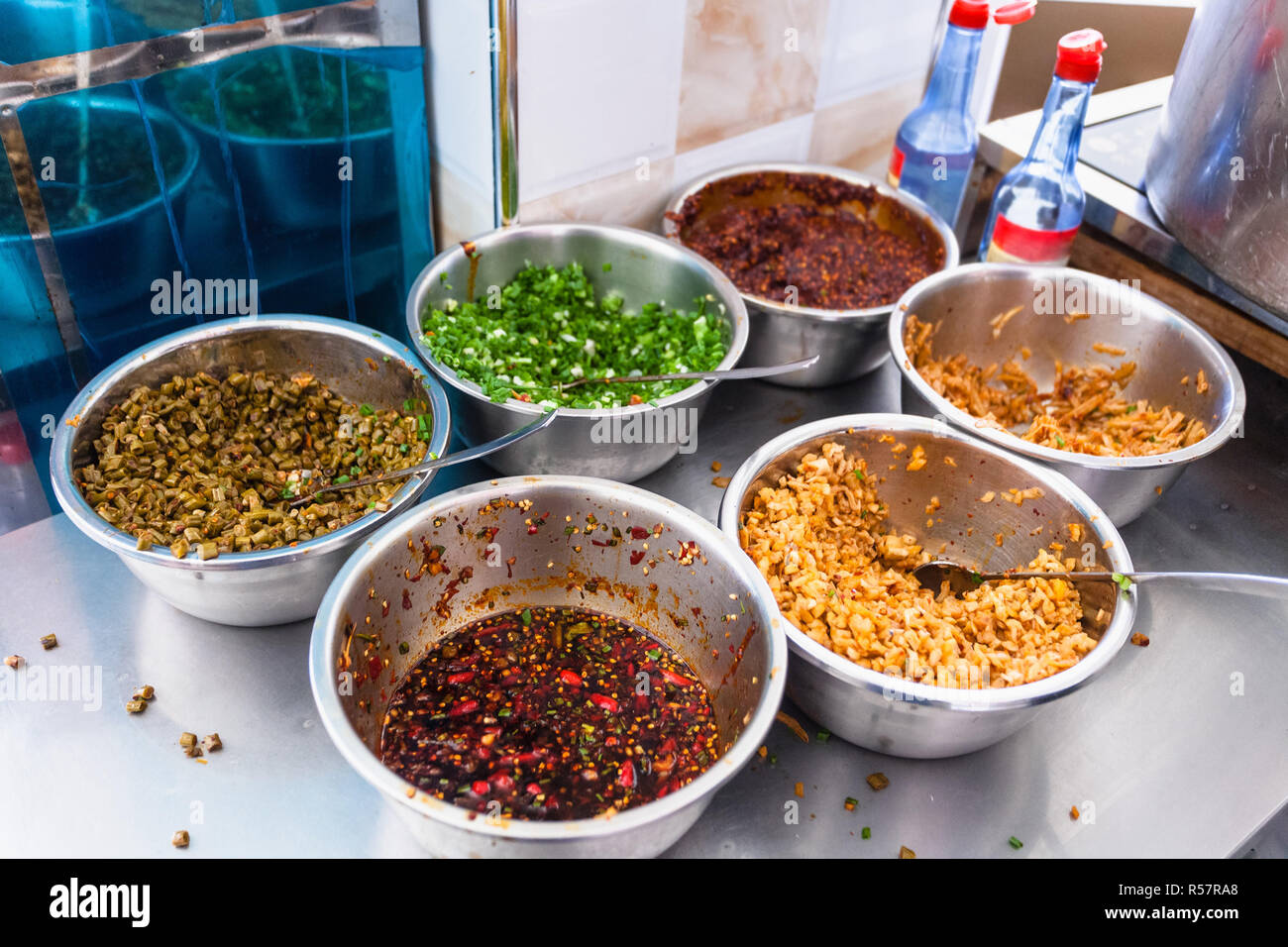 dishes with seasonings, spices and toppings Stock Photo Alamy