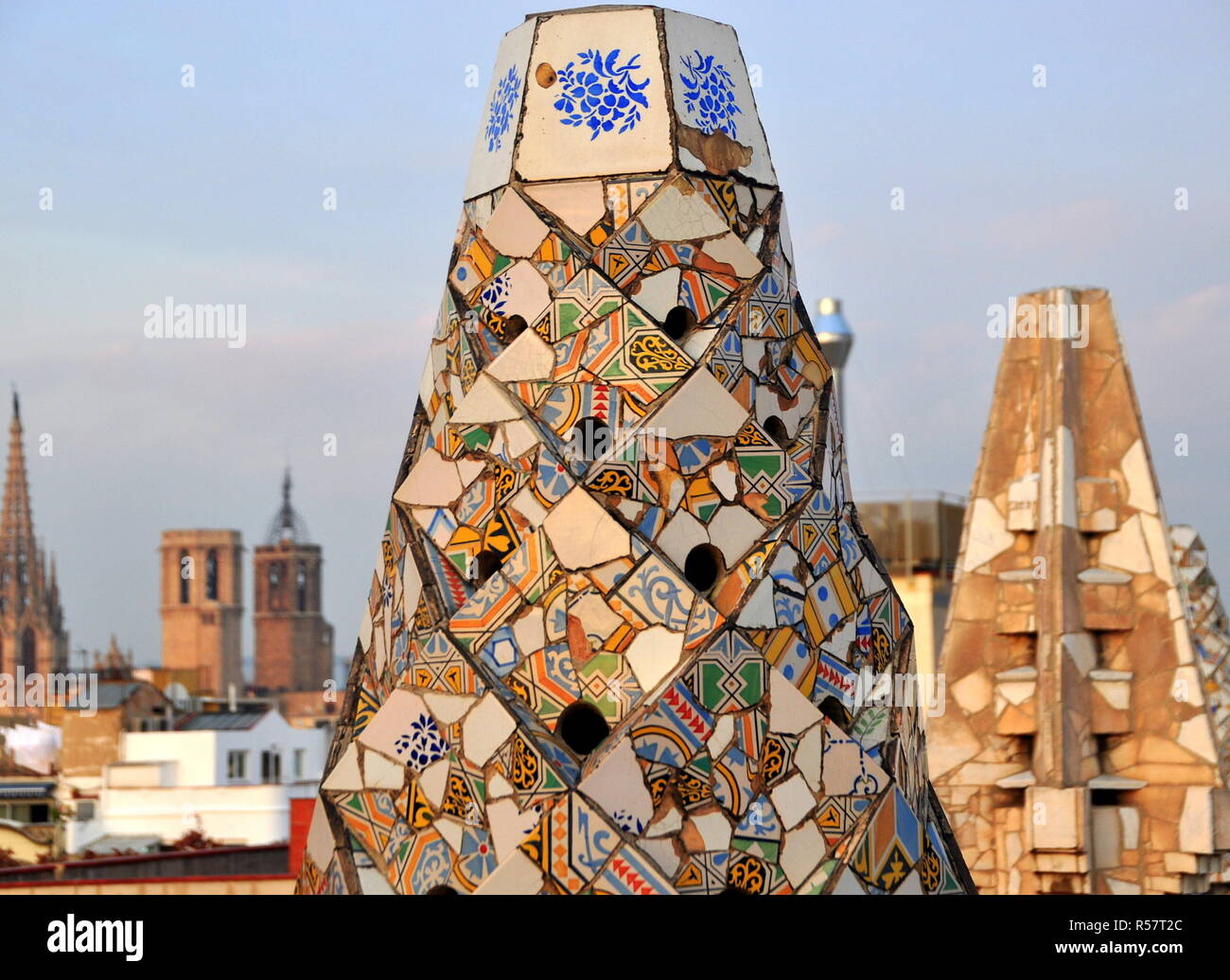 colorful chimneys with a wonderful view on the roof of gaudi's palau gÃ¼ell Stock Photo