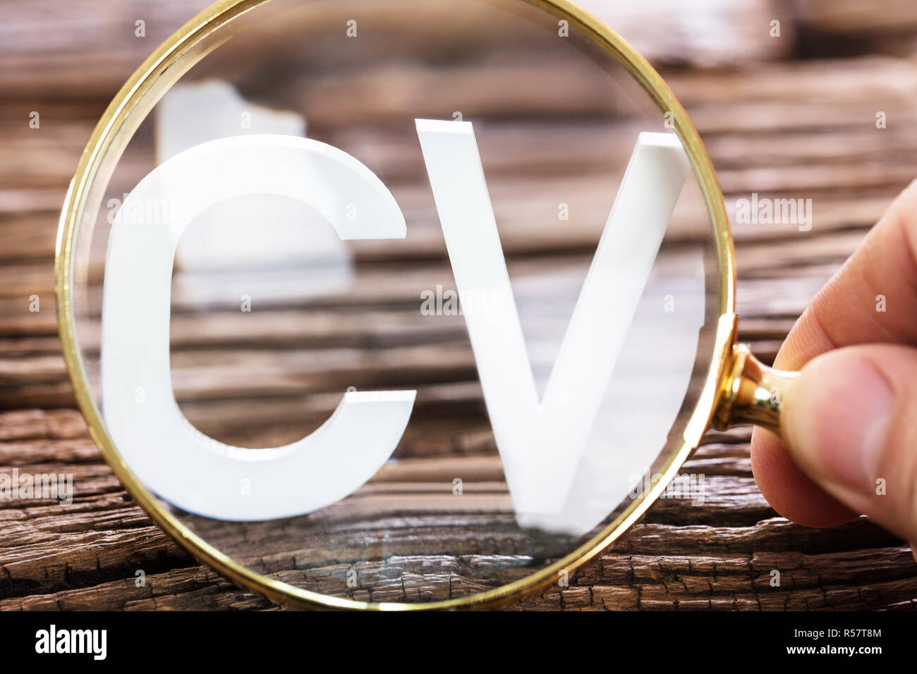 CV Word Through Magnifying Glass Stock Photo Alamy