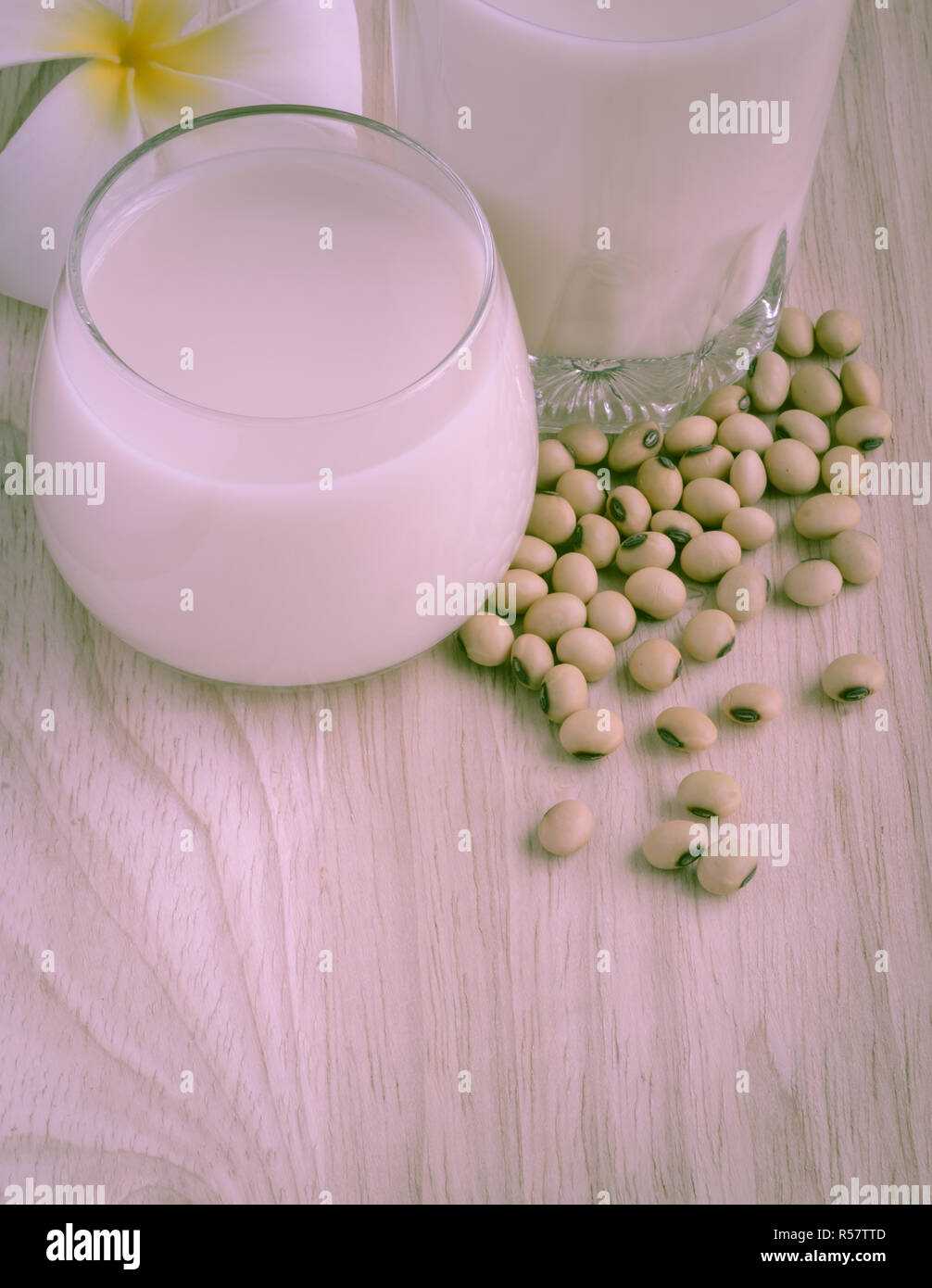 Fresh Soy milk (Soya milk) in a glass and soybean seeds Stock Photo Alamy