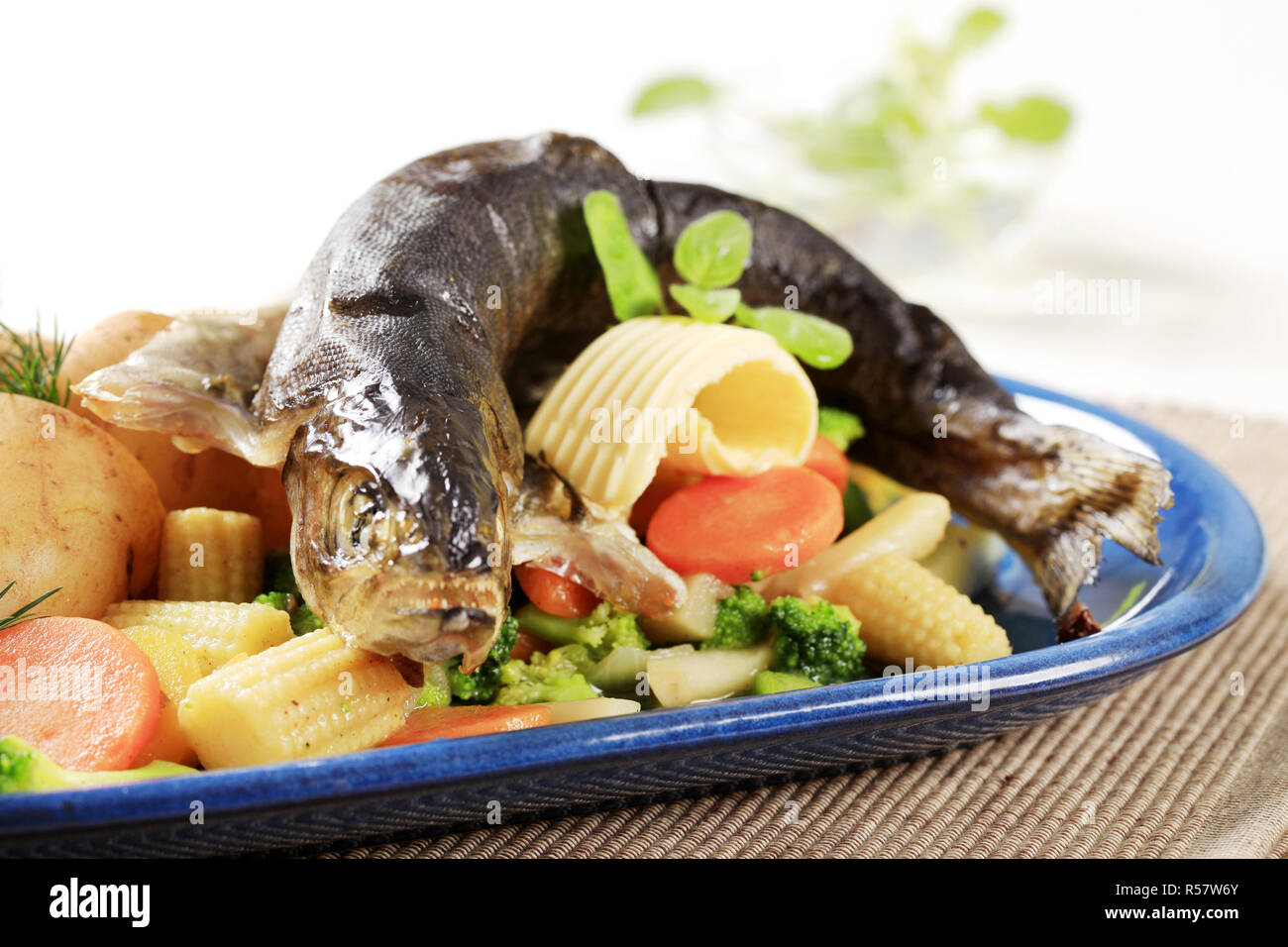 Trout en papillote with mixed vegetables Stock Photo Alamy