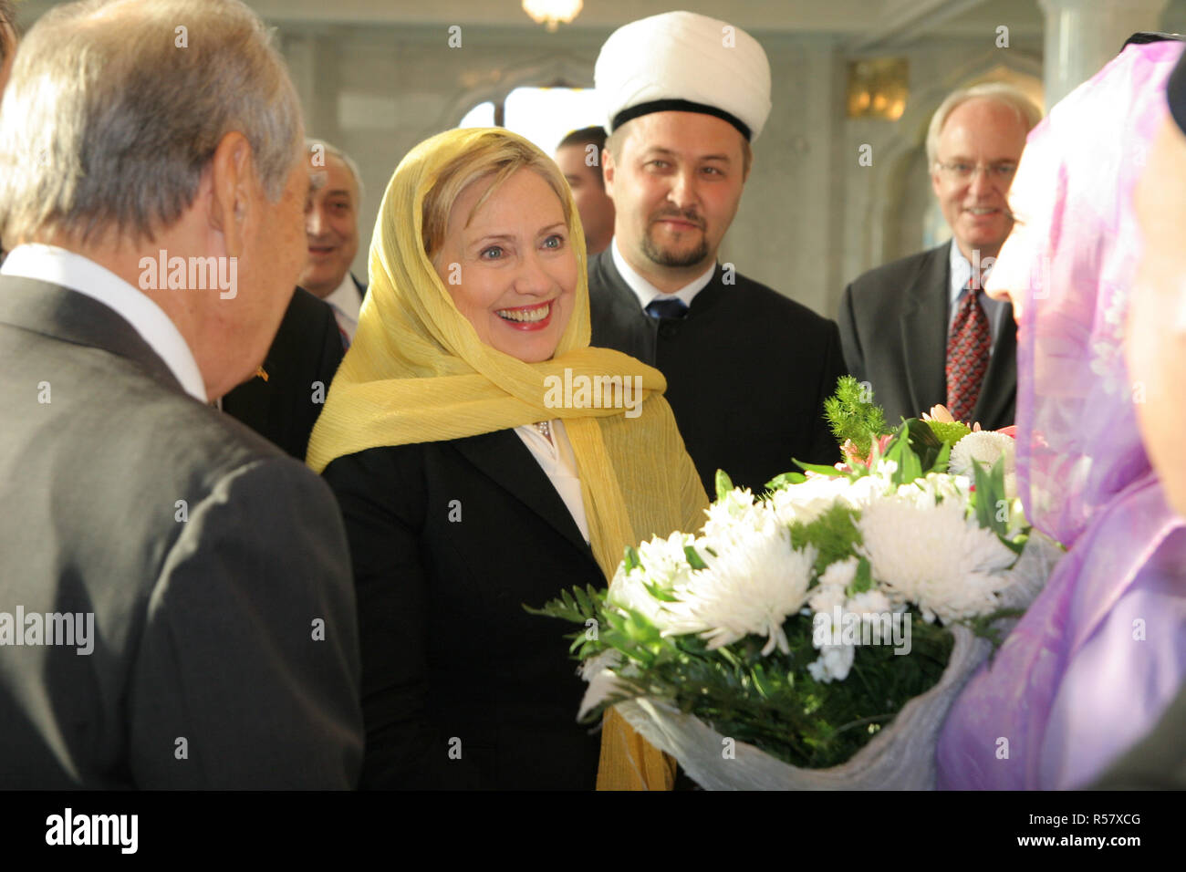 U.S. Secretary of State Hillary Rodham Clinton and Deputy Mufti Ramil Yunusov congratulate a newly wed couple in Kazan, Russia October 14, 2009. Stock Photo