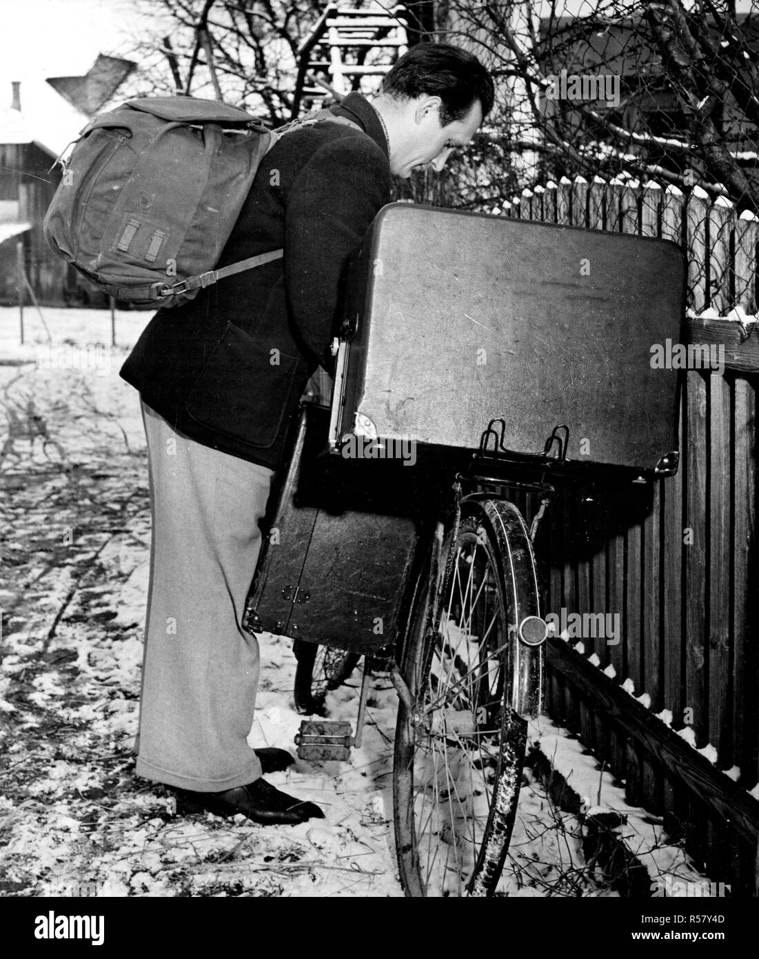 Original caption: 'Sweeney Steps Out.' Sweeney is the star of one of the many instructive and entertaining movie shorts the Linz, Upper Austria American House lends to volunteer operators who display them at rural schools and social centers. Stock Photo