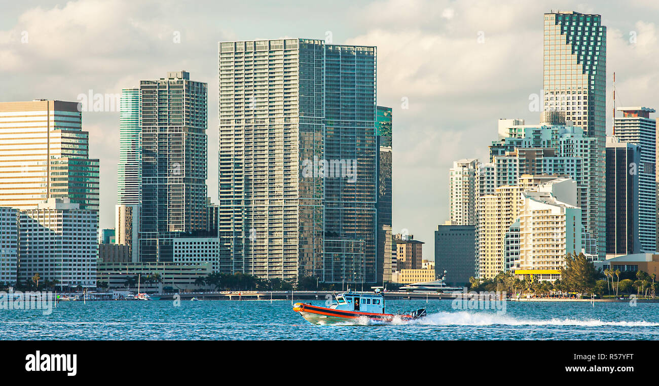 boat of the coast guard in front of the skyline of miami florida usa Stock Photo