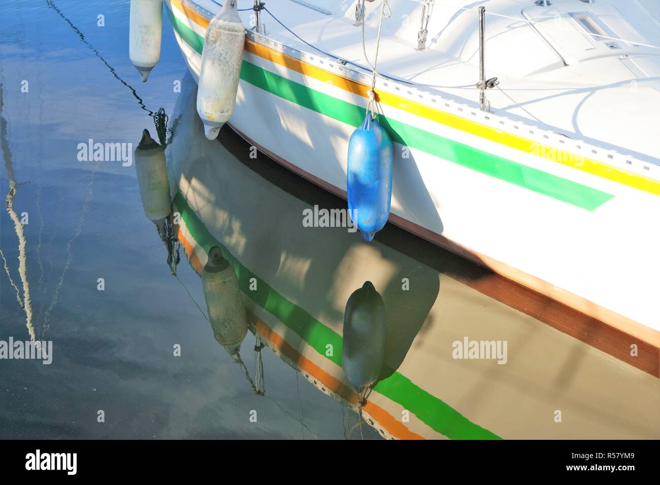 boat is reflected in the water Stock Photo - Alamy
