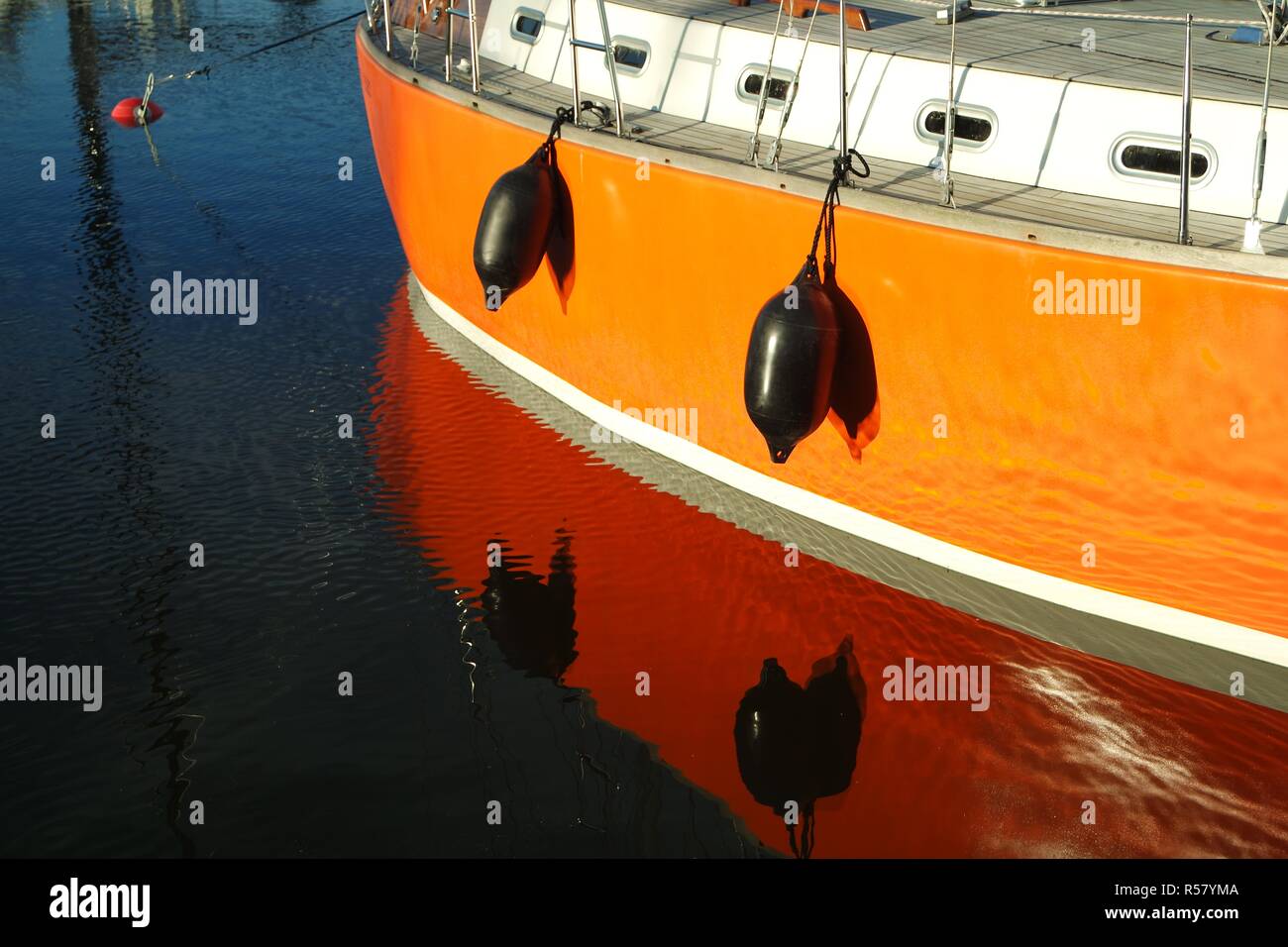boat is reflected in the water Stock Photo - Alamy
