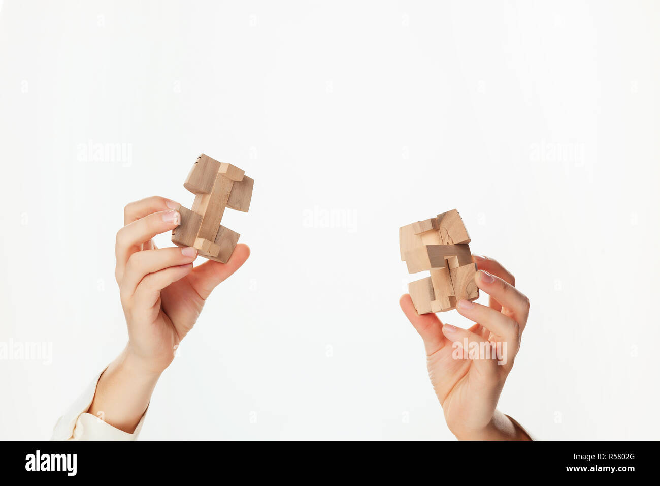 puzzle in hand isolated on white background Stock Photo - Alamy
